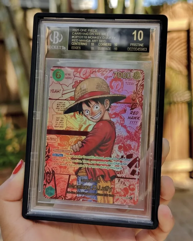 A graded One Piece card in a Beckett slab